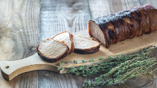 Pork loin wrapped in bacon